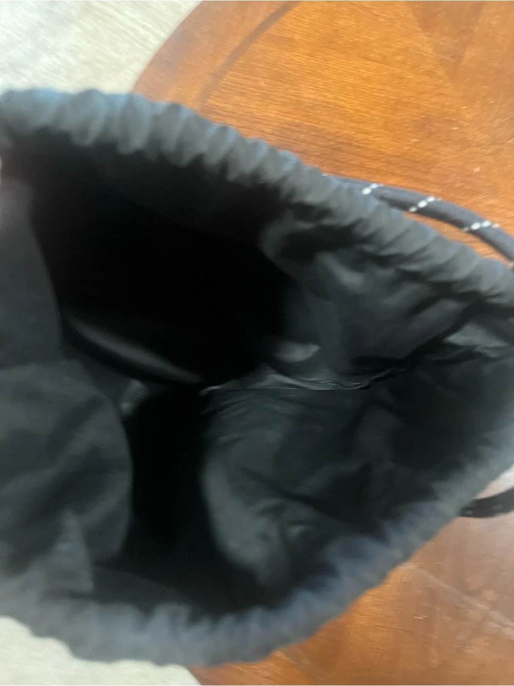 Nike Black Drawstring Backpack with White Swoosh Logo